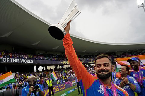 Virat Kohli with winners' trophy